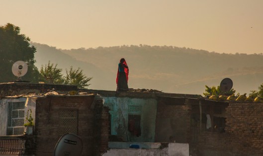 woman-on-roof